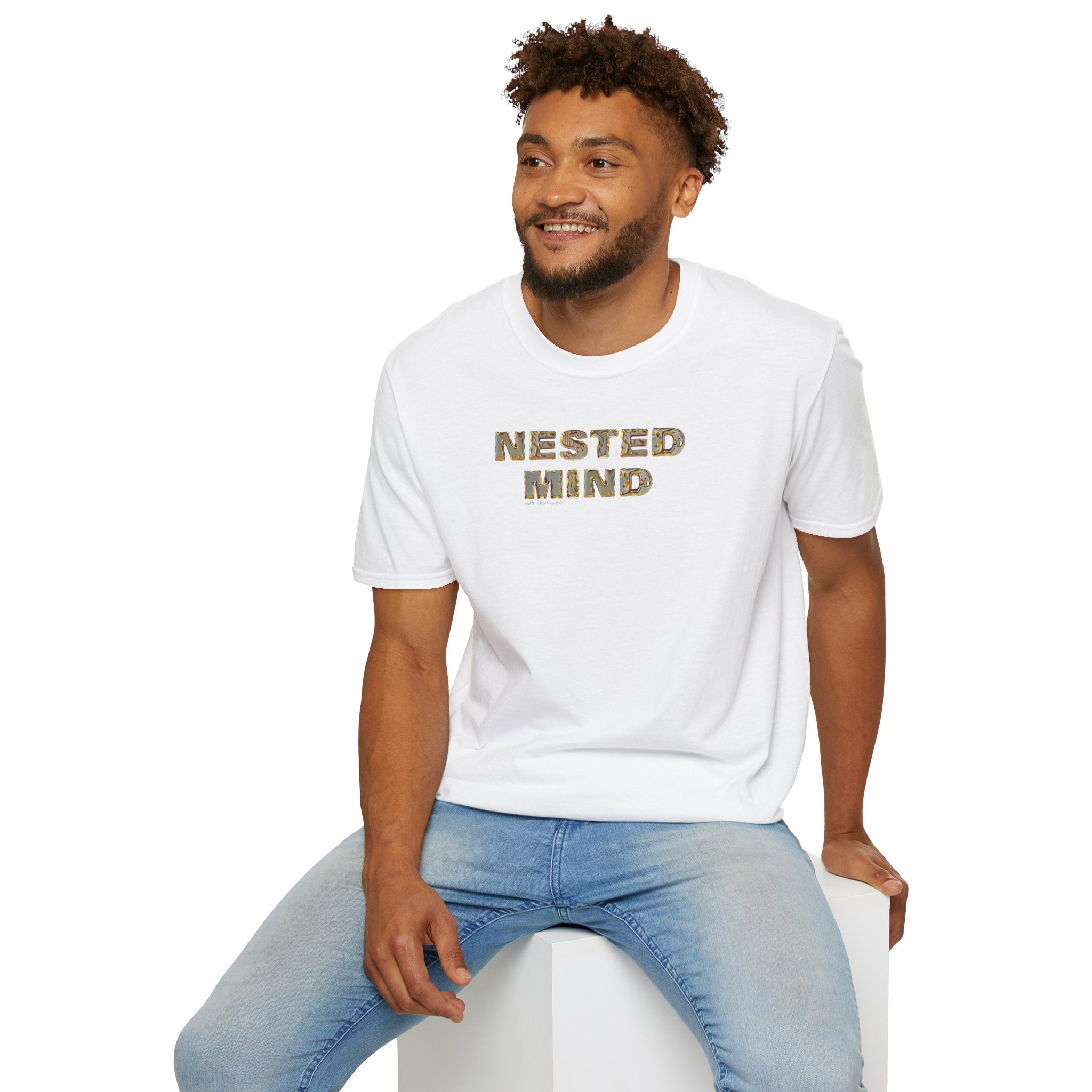 Gold letters on T-Shirt that say Nested Mind