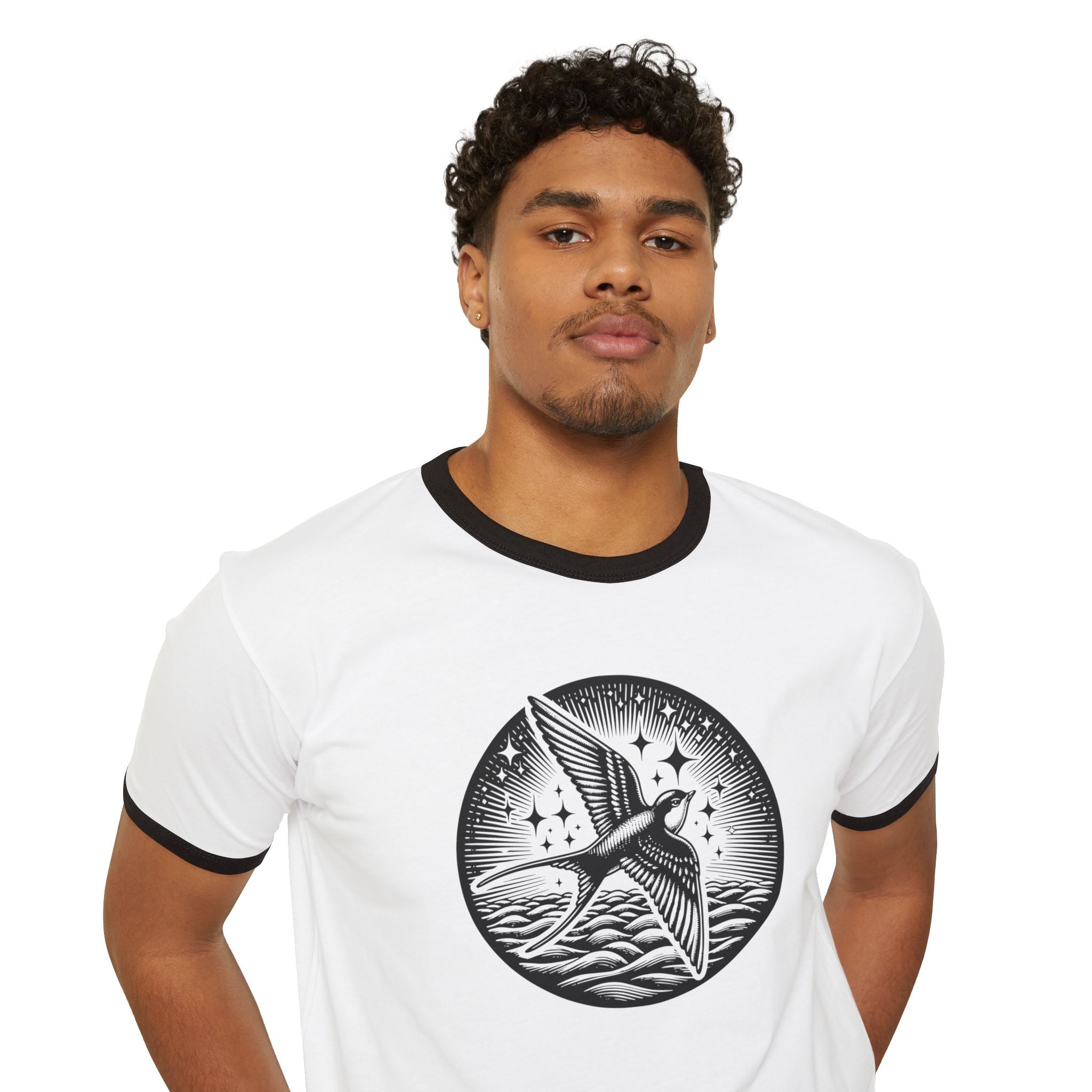 Graphic T-shirt with Swallow Bird flying above the clouds with stars